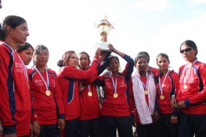 Bhagawati bhattrai team caption of nepal receving the winning sheeld.