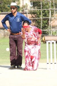 Ms Sudha Basnet bowling with blind fold