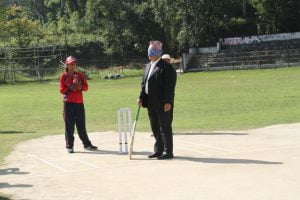 Sports Secretary of Nepal Government bating with blind fold in his eyes.