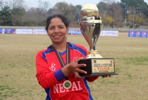 Nepal's captain with the trophy