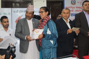 Minister of Youth and Sports awarding Blind Women Cricketers
